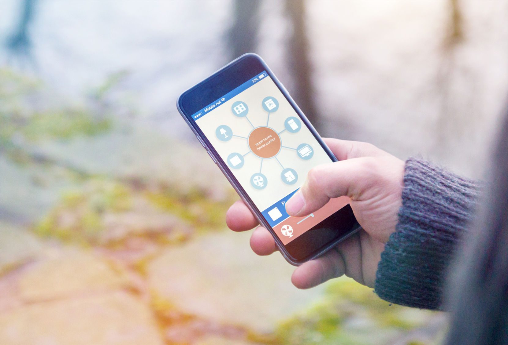 smart house, home automation, device illustration with app icons. it is in the nature holding his smartphone with smart home app